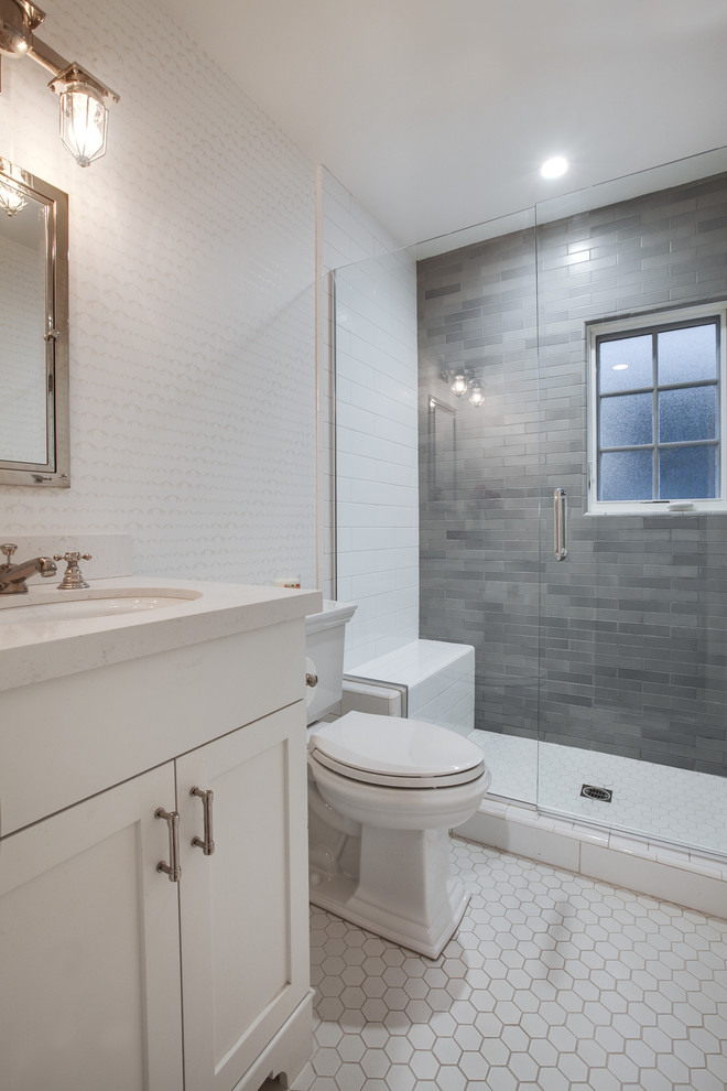 Inspiration for a small beach style kids bathroom in San Diego with furniture-like cabinets, white cabinets, an alcove shower, blue tile, an undermount sink, engineered quartz benchtops and a hinged shower door.