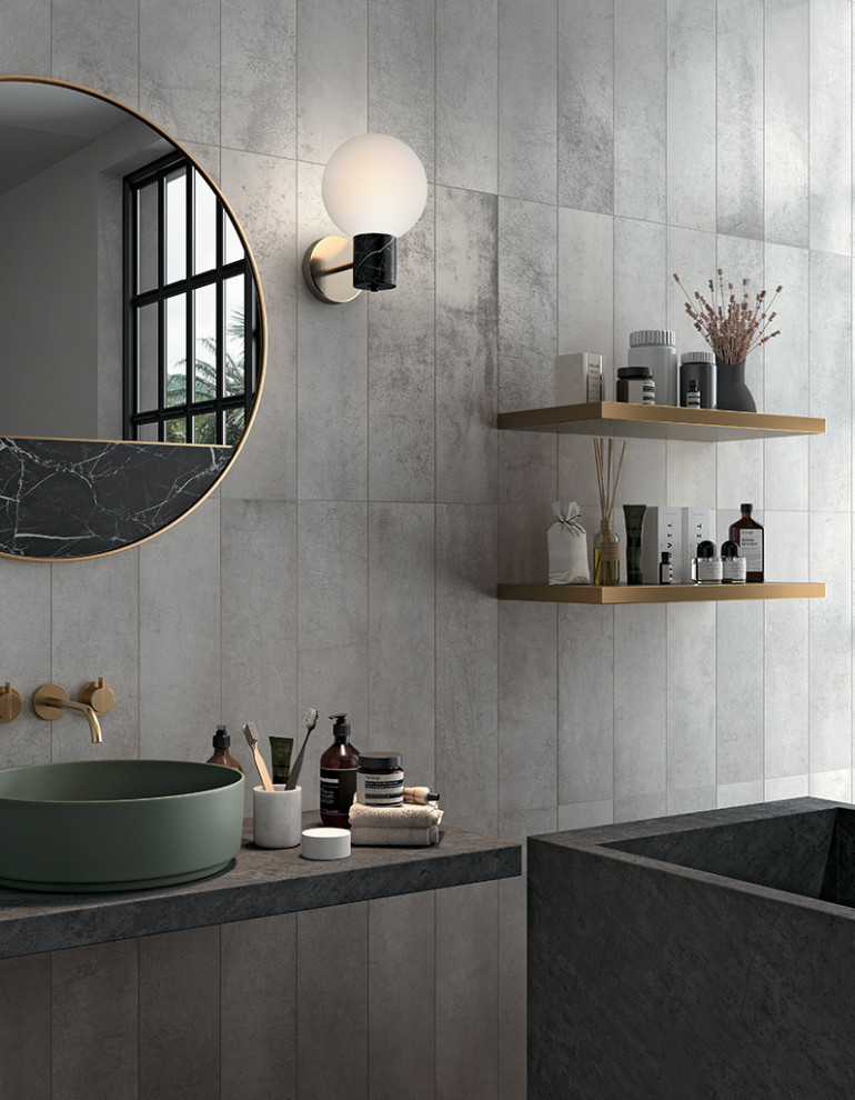 Photo of a contemporary bathroom in Perth with a freestanding tub, gray tile, porcelain tile, porcelain floors, a vessel sink, grey floor, a single vanity and a floating vanity.