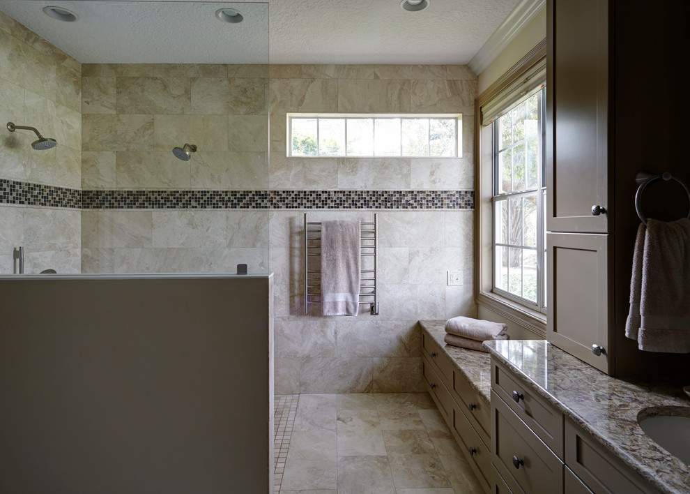 Design ideas for a large transitional master bathroom in Jacksonville with shaker cabinets, beige cabinets, a curbless shower, a two-piece toilet, beige tile, stone tile, beige walls, travertine floors, engineered quartz benchtops and an undermount sink.