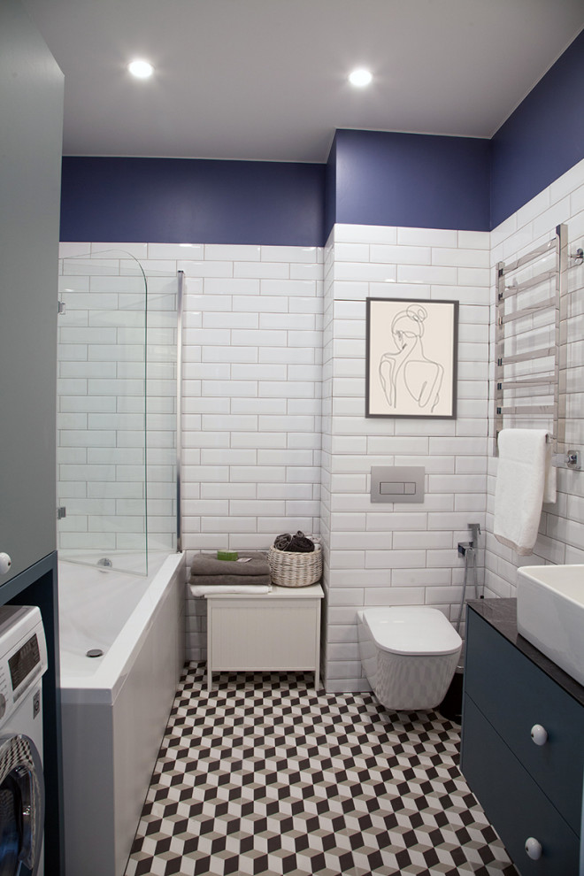 Photo of a mid-sized scandinavian master bathroom in Other with flat-panel cabinets, turquoise cabinets, an undermount tub, white tile, white walls, engineered quartz benchtops, a shower curtain, brown benchtops, a single vanity and a floating vanity.