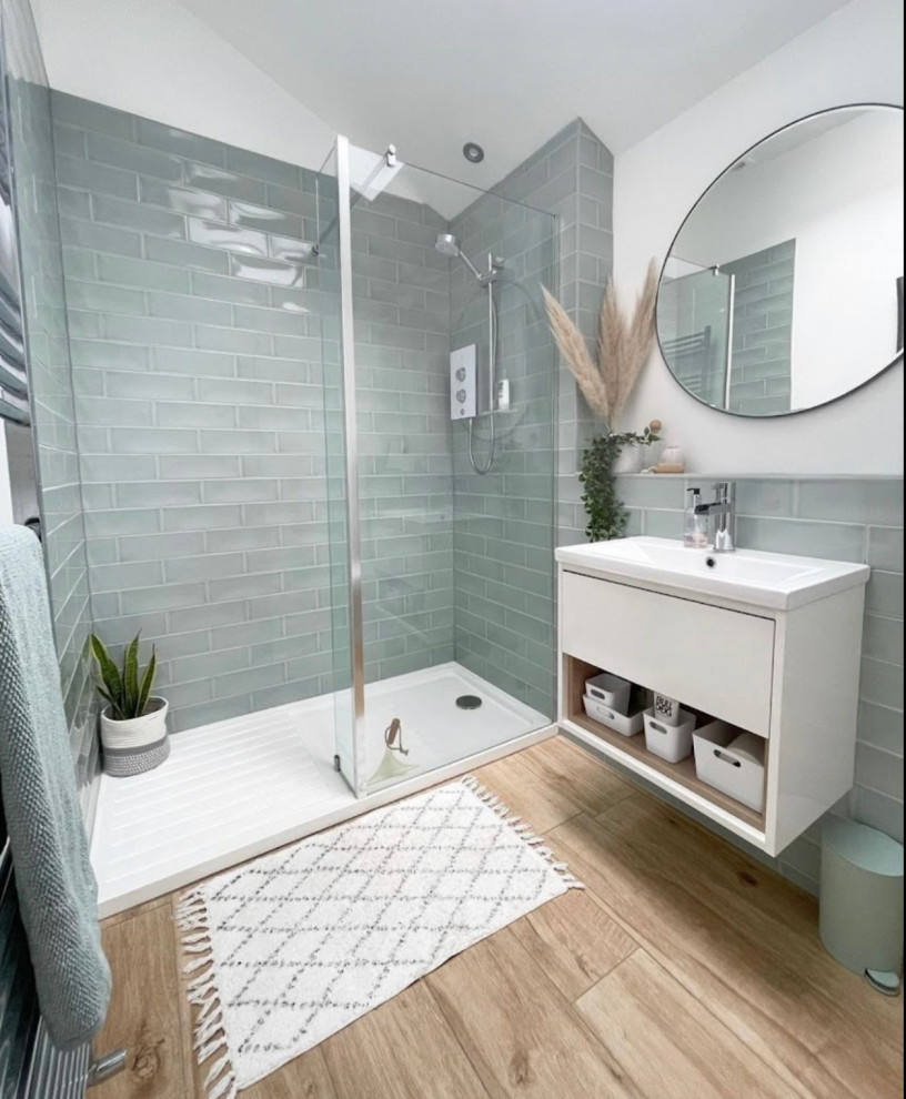 Example of a large minimalist 3/4 gray tile and subway tile light wood floor, brown floor, single-sink and vaulted ceiling bathroom design in Houston with flat-panel cabinets, white cabinets, white walls, a wall-mount sink, tile countertops, white countertops and a floating vanity