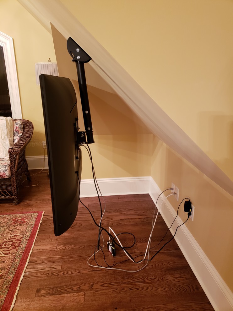 Need clever solution to hide power cords hanging from sloped ceiling