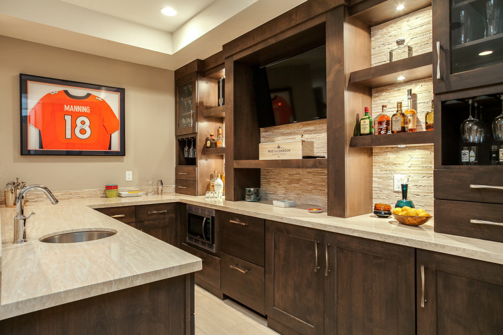 Photo of a mid-sized transitional l-shaped bar cart in Santa Barbara with an undermount sink, shaker cabinets, dark wood cabinets and light hardwood floors.