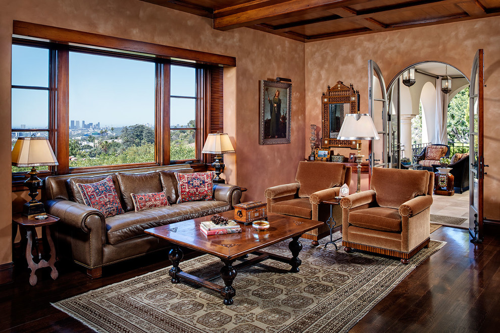 Photo of a mediterranean enclosed living room in Other with dark hardwood floors.