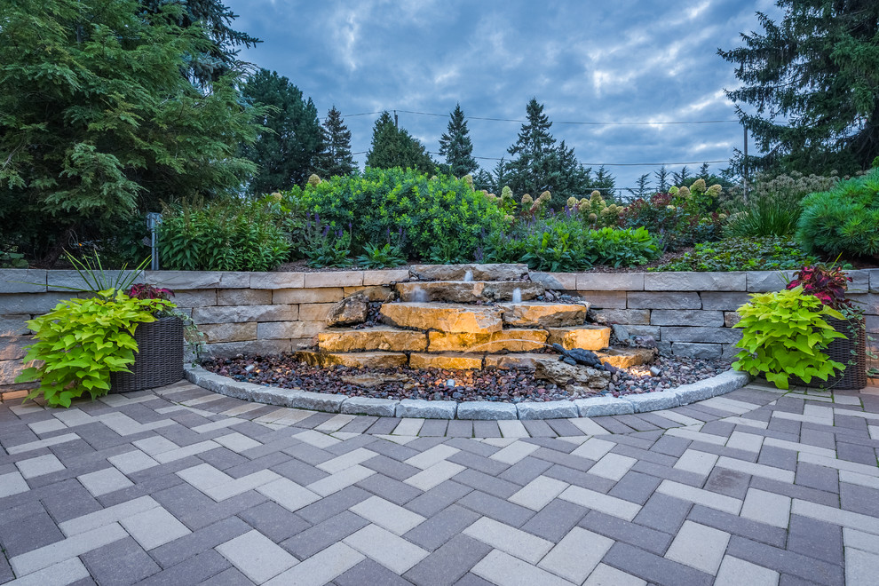Inspiration for a transitional brick formal garden in Milwaukee.