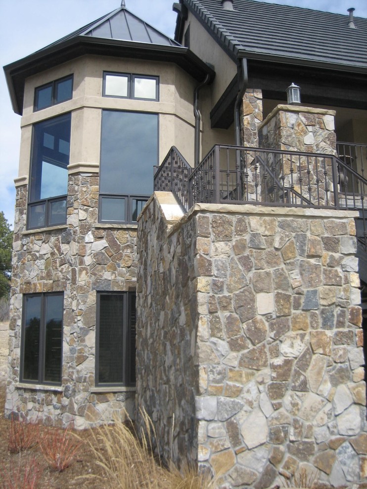 Rustic exterior home idea in Denver