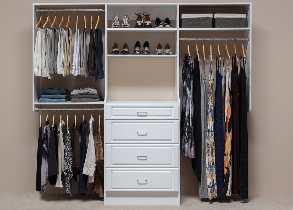 Mid-sized contemporary women's built-in wardrobe in Boston with raised-panel cabinets, white cabinets and carpet.