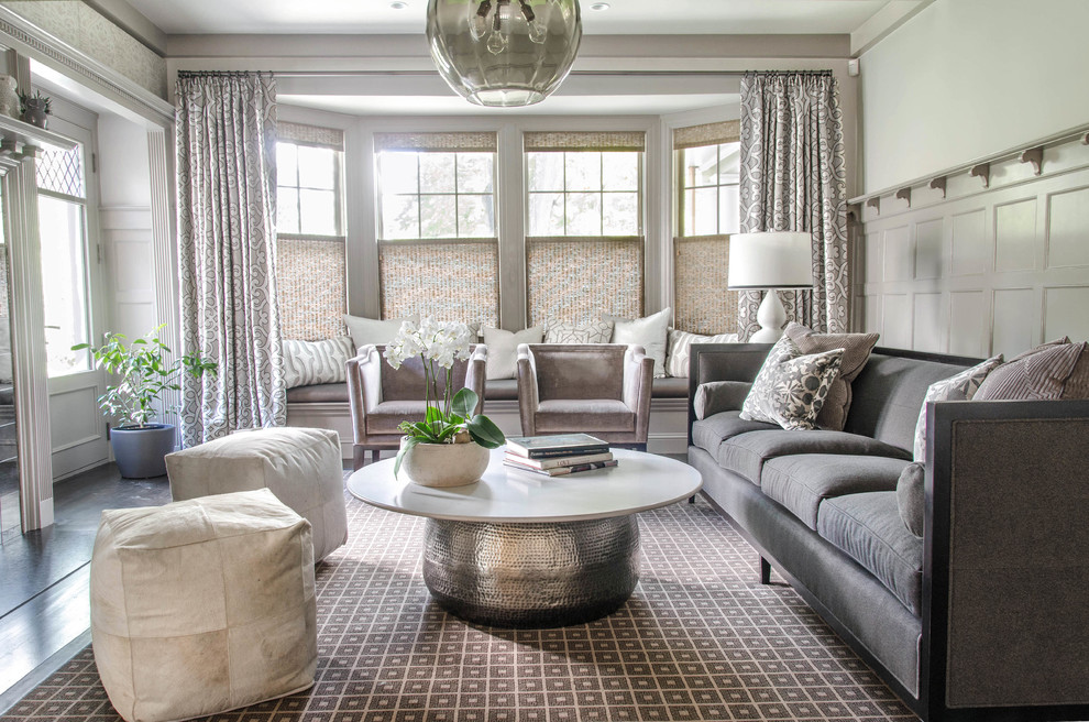 This is an example of a transitional formal living room in Boston with white walls.