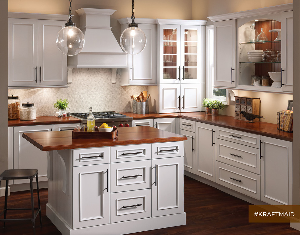 Traditional kitchen in Detroit with recessed-panel cabinets and white cabinets.