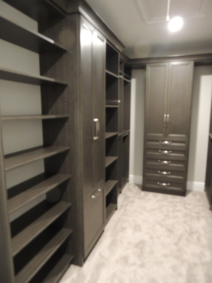 Inspiration for a large transitional gender-neutral walk-in wardrobe in Philadelphia with shaker cabinets and distressed cabinets.
