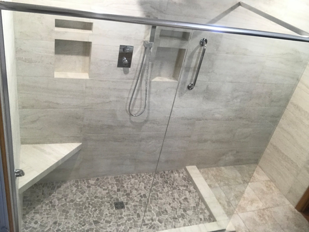 Inspiration for a large transitional master beige tile and ceramic tile pink floor corner shower remodel with beige walls