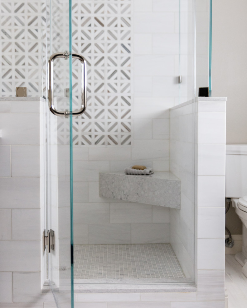 This is an example of a large transitional master bathroom in San Francisco with furniture-like cabinets, medium wood cabinets, a freestanding tub, an alcove shower, white tile, marble, marble floors, an undermount sink, engineered quartz benchtops, grey floor, beige benchtops, a double vanity, a freestanding vanity and decorative wall panelling.