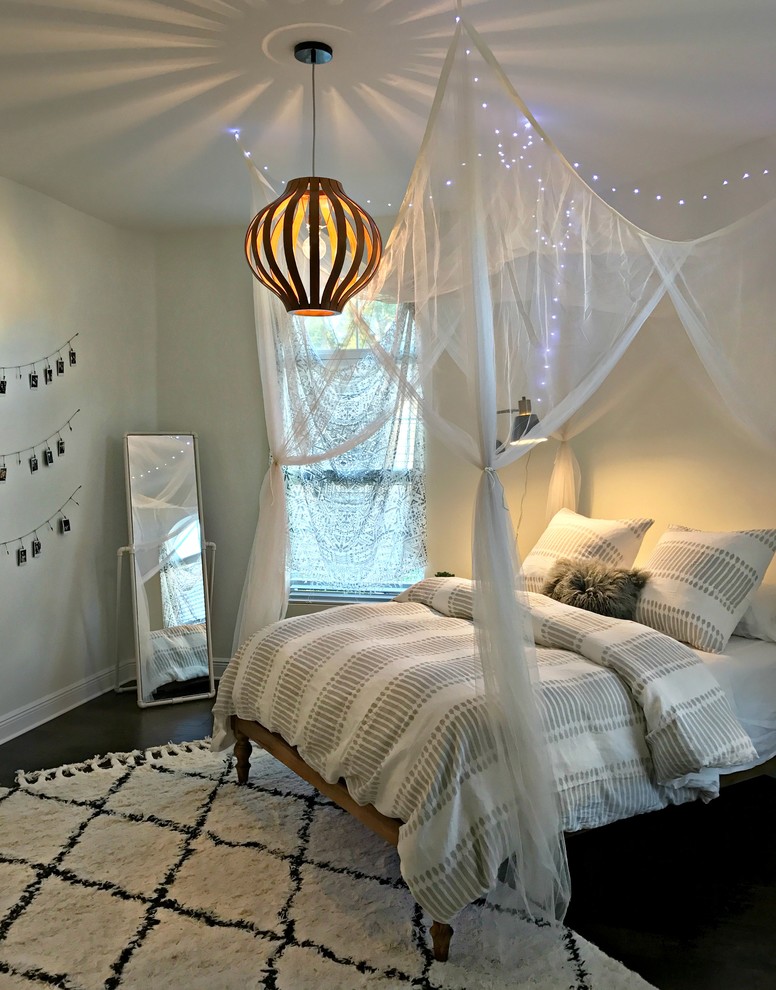 Inspiration for a mid-sized transitional kids' room for girls in Tampa with grey walls, dark hardwood floors and brown floor.