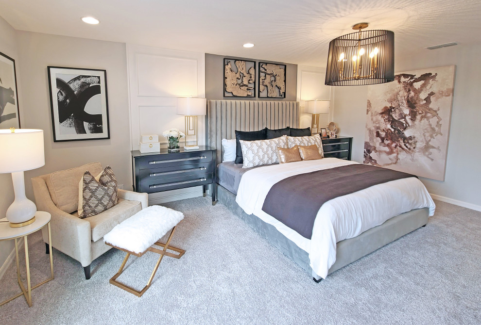 Photo of a mid-sized transitional master bedroom in Orlando with grey walls, carpet, grey floor and panelled walls.