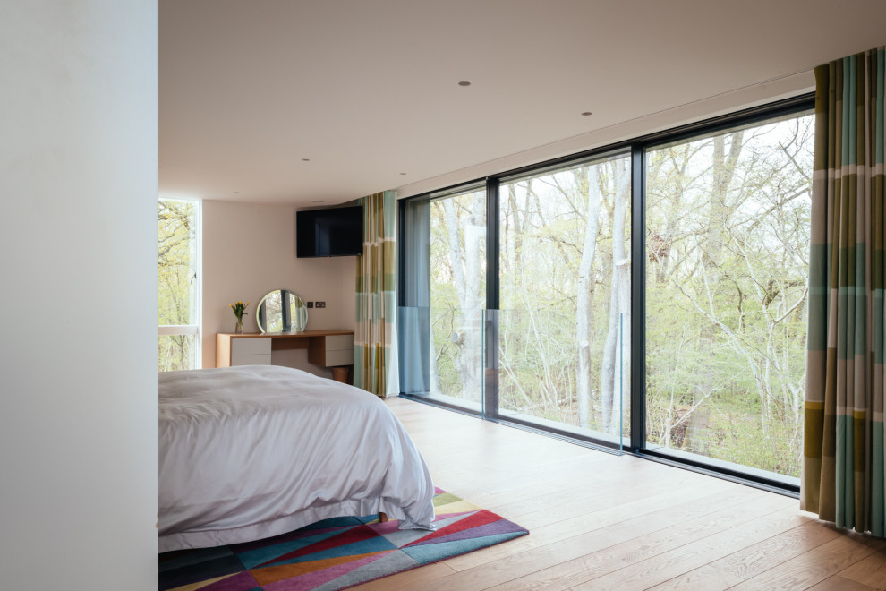Contemporary bedroom in Hampshire.