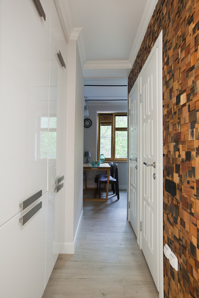 Design ideas for a contemporary hallway in Moscow with brown walls.