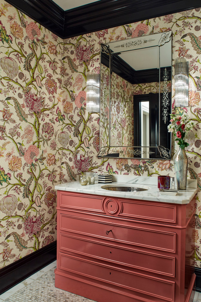 Photo of a coastal cloakroom in Orange County with marble worktops and wallpapered walls.