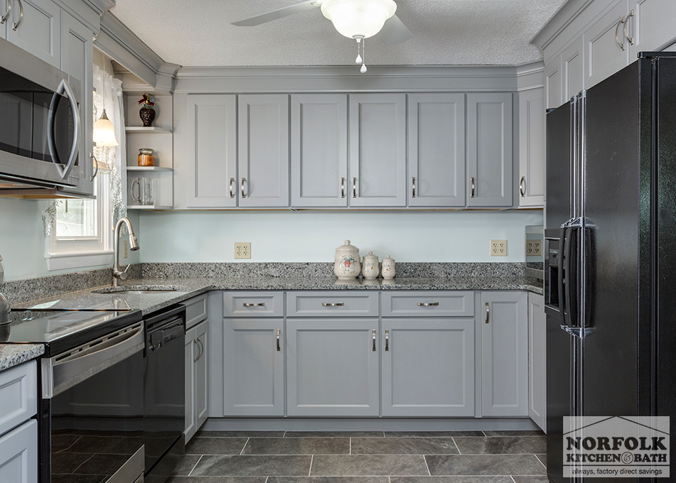 Mid-sized transitional u-shaped home design photo in Boston with an undermount sink, shaker cabinets, gray cabinets, granite countertops, stainless steel appliances and no island