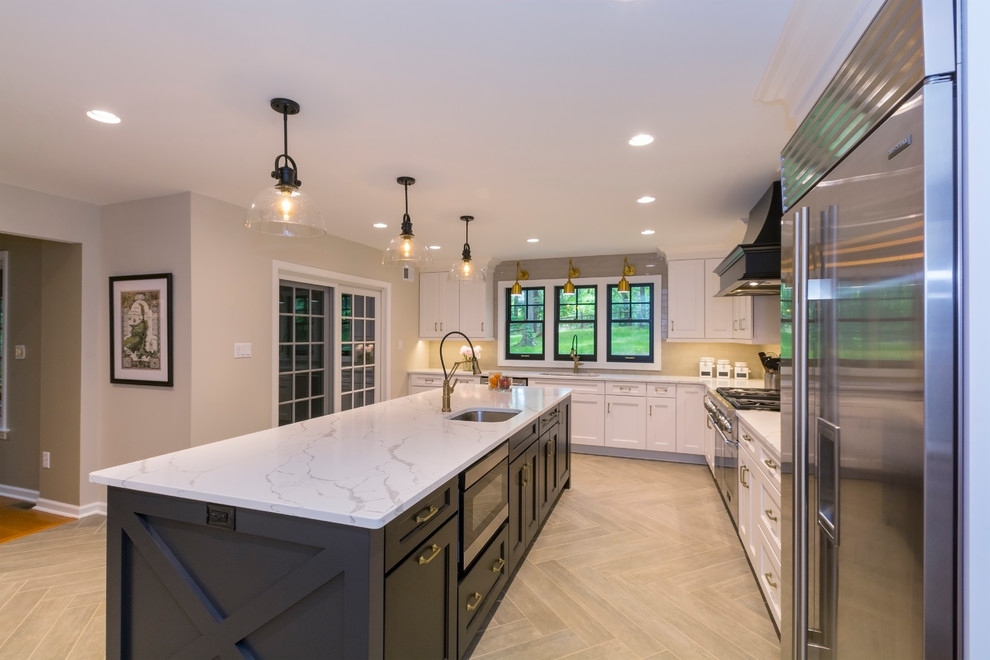 Inspiration for a transitional brown floor kitchen remodel with an island