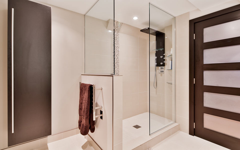 Design ideas for a contemporary bathroom in Montreal with beige tile, ceramic tile, beige walls and ceramic floors.