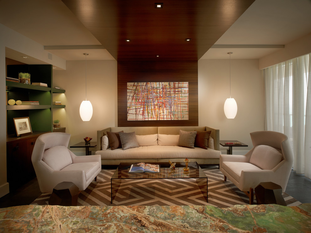 Inspiration for a large eclectic living room in Miami with beige walls.