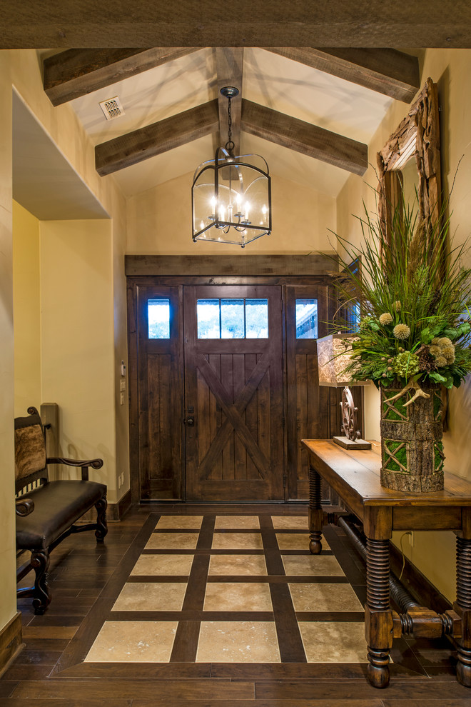 Inspiration for a rustic entryway remodel in Austin