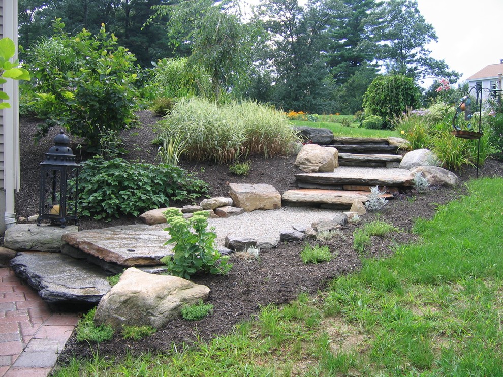 Inspiration for a traditional stone landscaping in Boston.