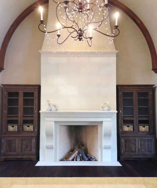 This floor to ceiling limestone fireplace was designed by DeSantana Stone Co for the great room of a southern home. Our team of design professionals is