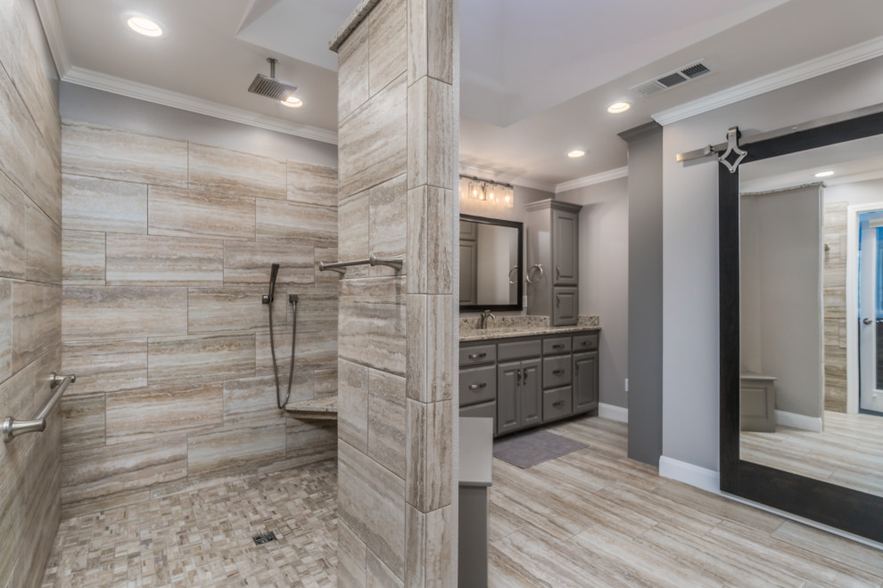 Large transitional master porcelain tile porcelain tile and double-sink corner shower photo with raised-panel cabinets, gray cabinets, a two-piece toilet, beige walls, an undermount sink, granite countertops and a built-in vanity