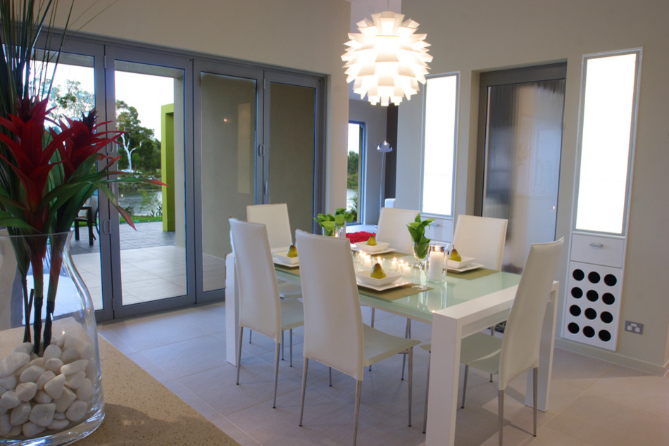 Design ideas for a beach style dining room in Brisbane.