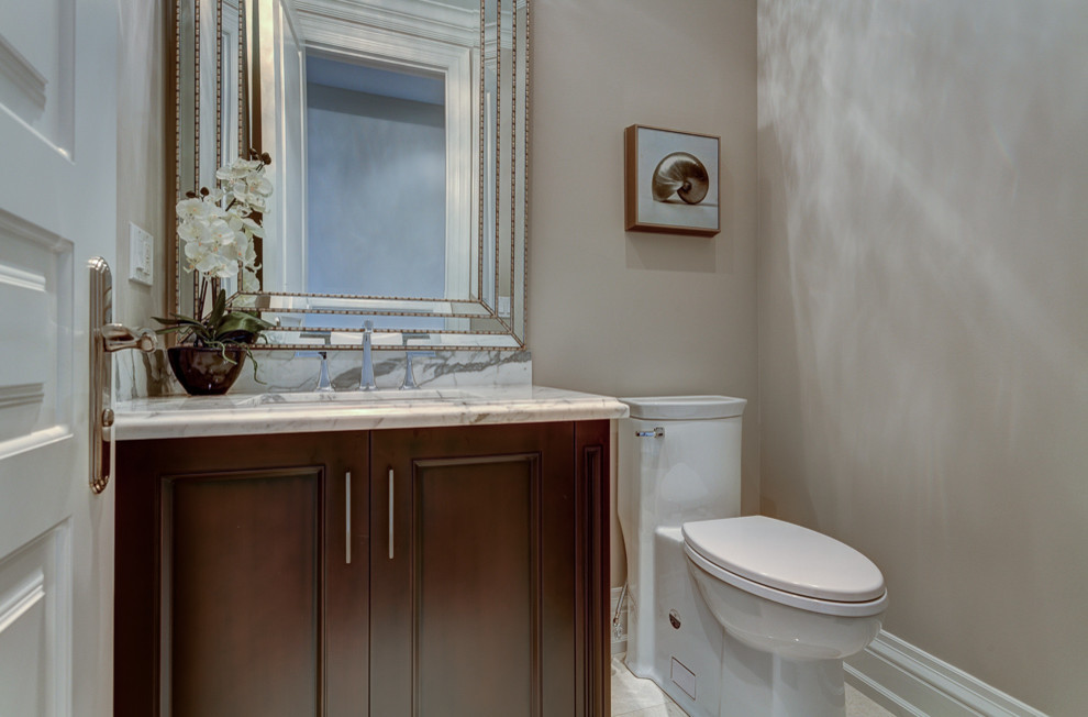 Design ideas for a traditional powder room in Toronto.