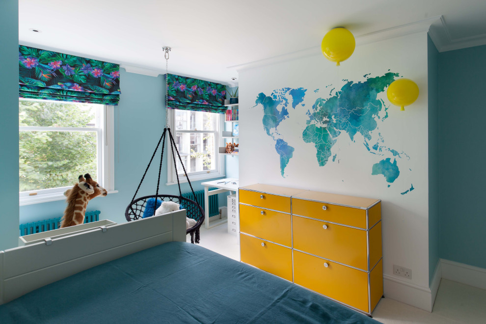 Small modern kids' bedroom in London with blue walls, carpet, white floor, recessed and wallpaper for kids 4-10 years old and girls.