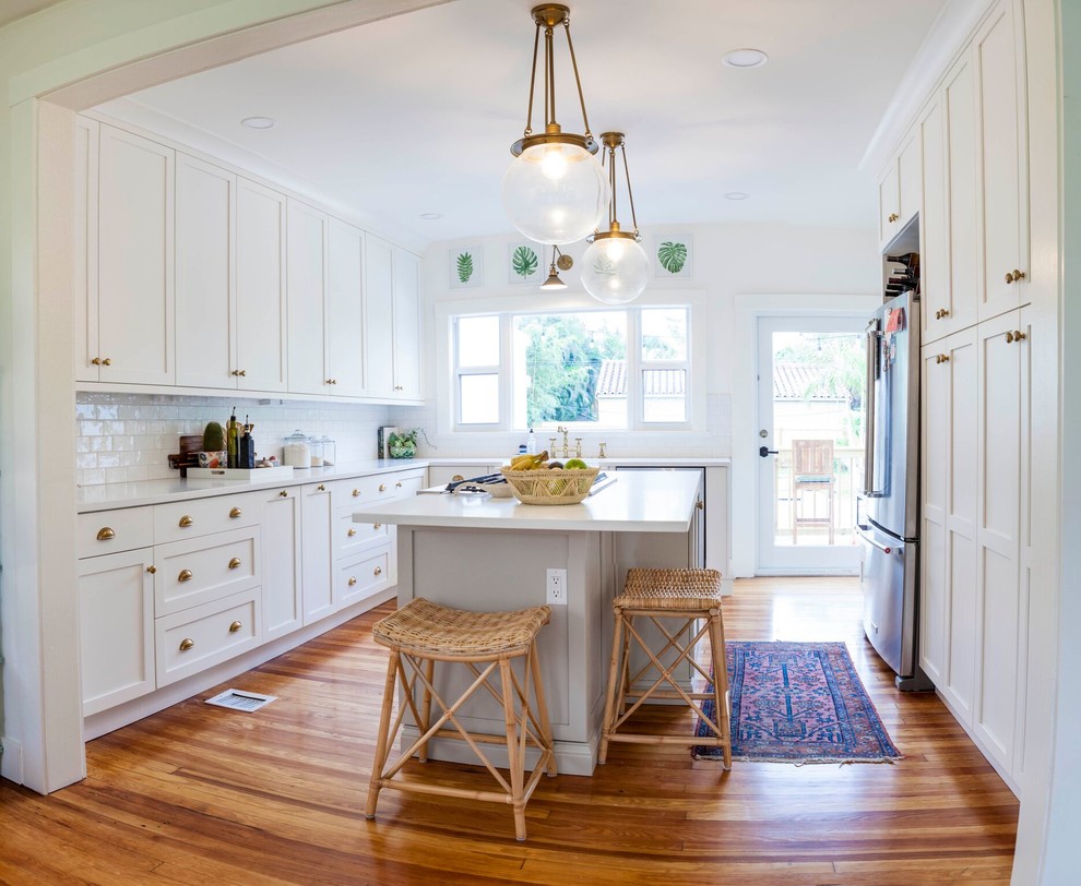 Example of a transitional kitchen design in Miami