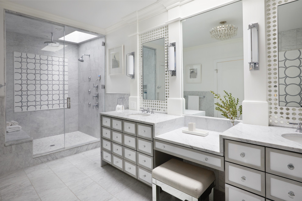 Inspiration for a transitional master bathroom in New York with recessed-panel cabinets, white cabinets, an alcove shower, gray tile, white tile, marble, white walls, marble floors, an undermount sink, marble benchtops, a hinged shower door, multi-coloured benchtops, a double vanity and a built-in vanity.