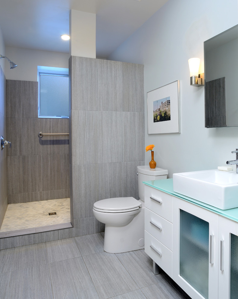 Trendy doorless shower photo in Chicago with a vessel sink and blue countertops