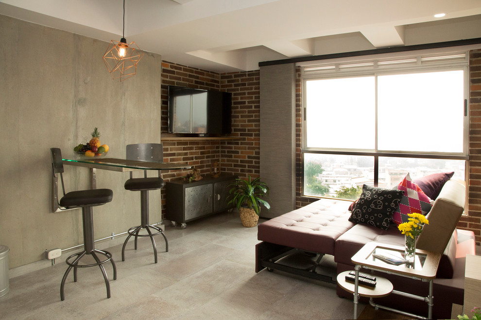 Example of a small urban ceramic tile living room design with a wall-mounted tv