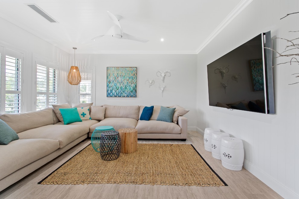 Inspiration for a beach style family room in Brisbane.