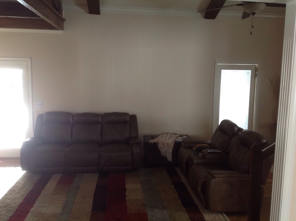Picture centered behind couch or centered on wall