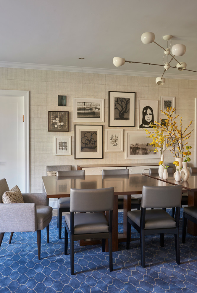 Photo of an eclectic dining room in New York with beige walls and carpet.