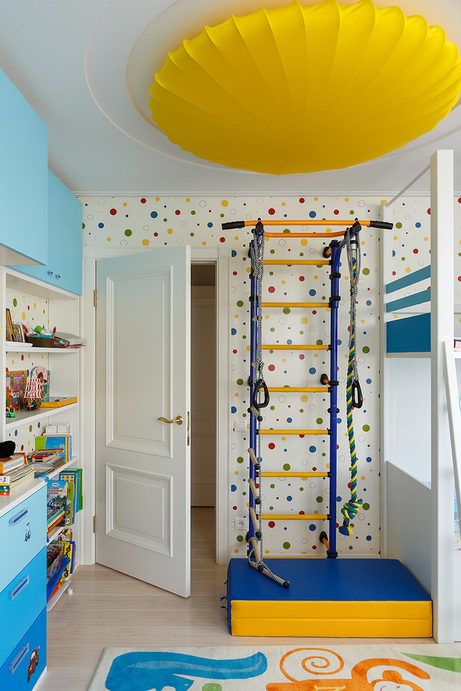 Contemporary kids' playroom in Saint Petersburg with multi-coloured walls, light hardwood floors and beige floor for kids 4-10 years old and boys.
