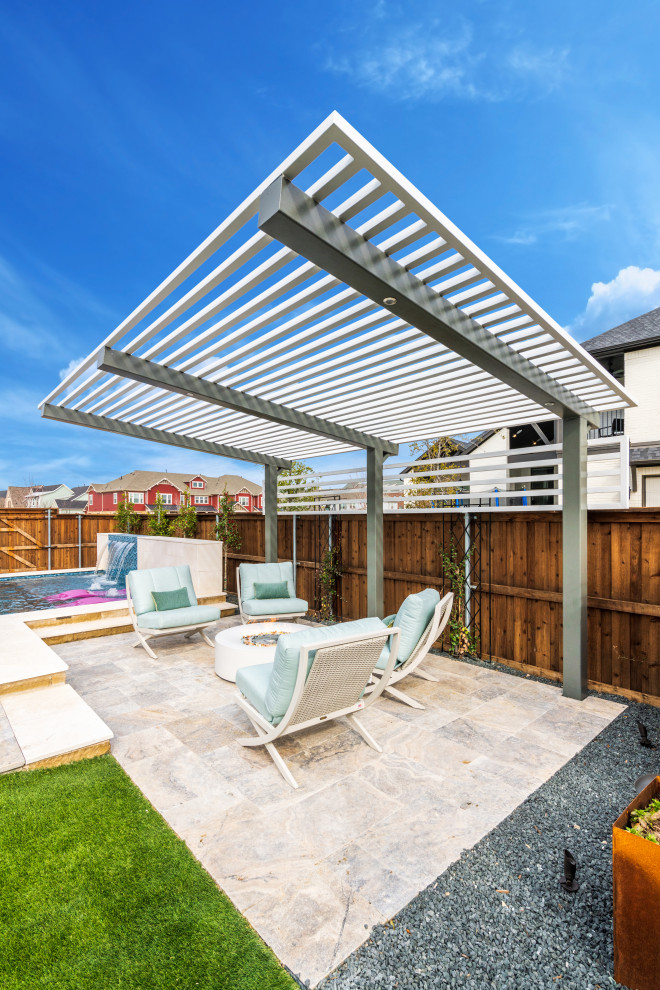 Pool - mid-sized transitional backyard stone and custom-shaped pool idea in Dallas
