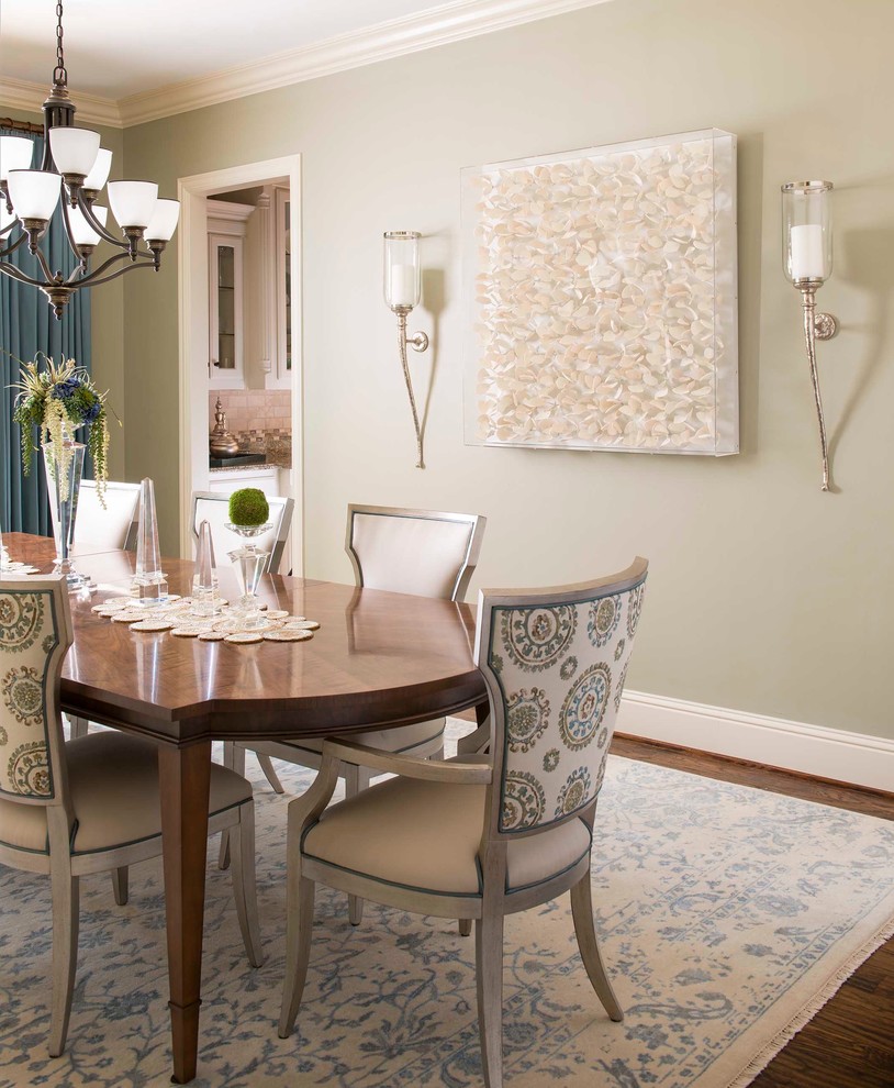This is an example of a transitional dining room in Dallas with grey walls and dark hardwood floors.