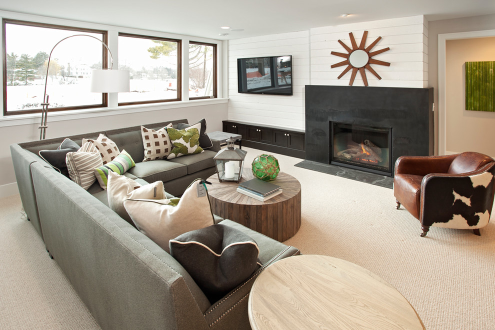 Inspiration for a mid-sized transitional living room in Minneapolis with white walls, carpet, a standard fireplace, a metal fireplace surround and white floor.