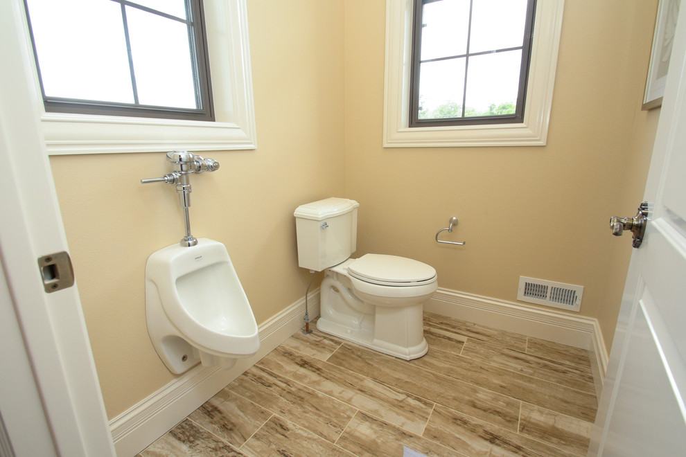 Photo of a master bathroom in Milwaukee with an urinal.