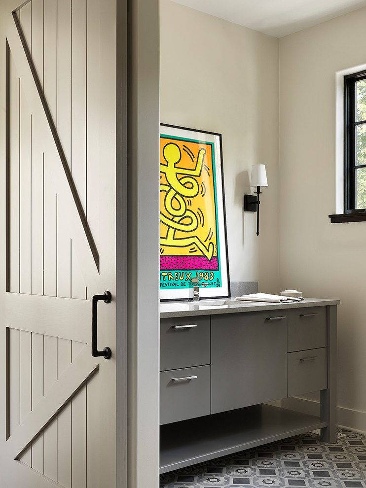 Inspiration for a scandinavian gray floor powder room remodel in Chicago with flat-panel cabinets, gray cabinets, beige walls, an undermount sink and white countertops