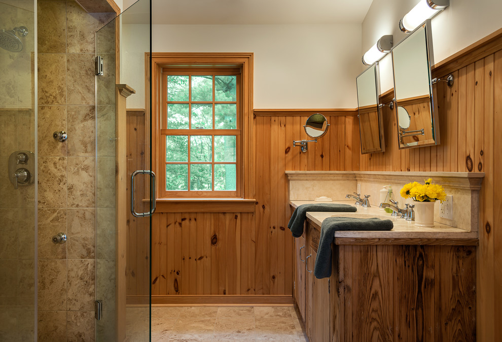 This is an example of a country bathroom in New York with beige tile.