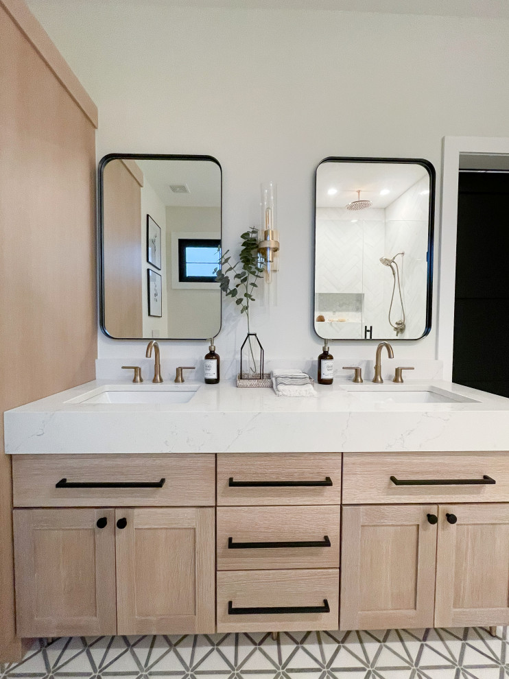 Mid-sized contemporary master bathroom in Detroit with shaker cabinets, light wood cabinets, a wall-mount toilet, white tile, marble, white walls, marble floors, an undermount sink, engineered quartz benchtops, grey floor, a hinged shower door, white benchtops, a shower seat, a double vanity, a freestanding vanity and an alcove shower.