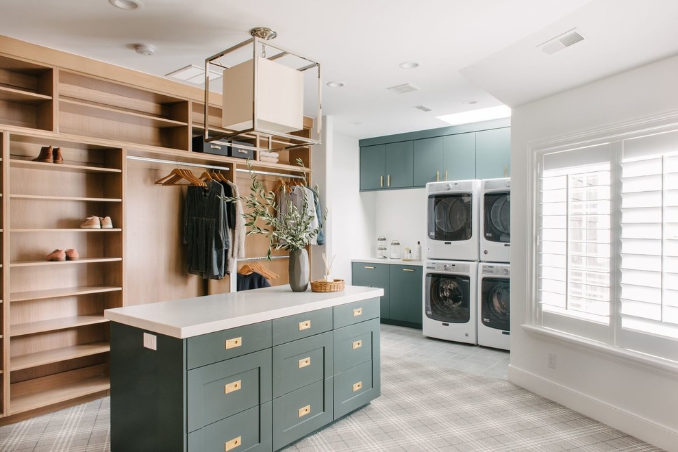 Inspiration for a large transitional gender-neutral dressing room in Salt Lake City with shaker cabinets, green cabinets, carpet and grey floor.