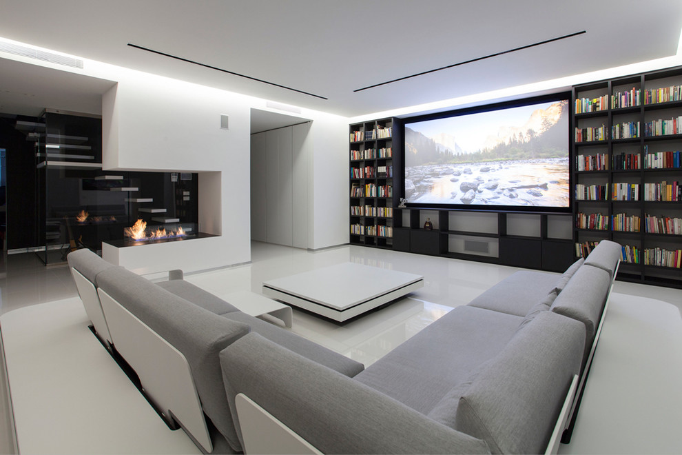 Design ideas for a large contemporary open concept home theatre in Milan with white walls, porcelain floors, a built-in media wall and white floor.