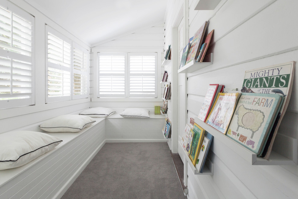Small beach style gender-neutral kids' study room in Sydney with white walls, carpet and grey floor.